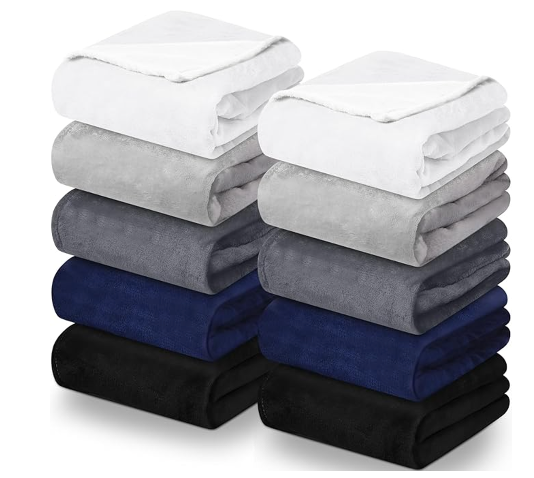 white, gray navy and black fleece blankets. 50x60 inches